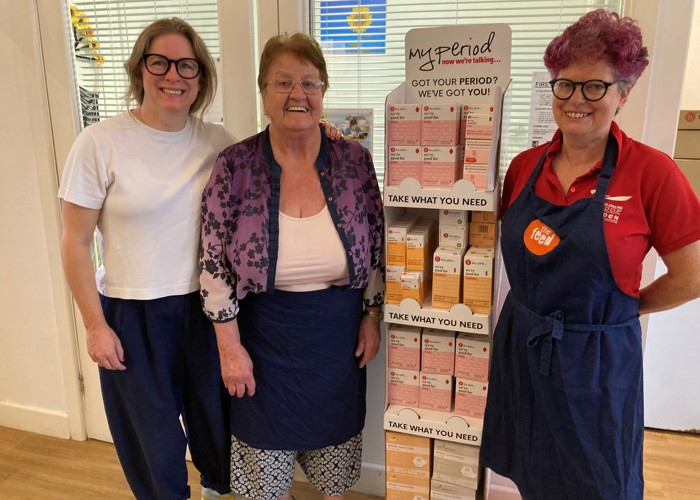 My Period Director, Hannah Cooke, with two volunteers at The Feed social supermarket in Norwich installing the PickUpMyPeriod free period product collection point.
